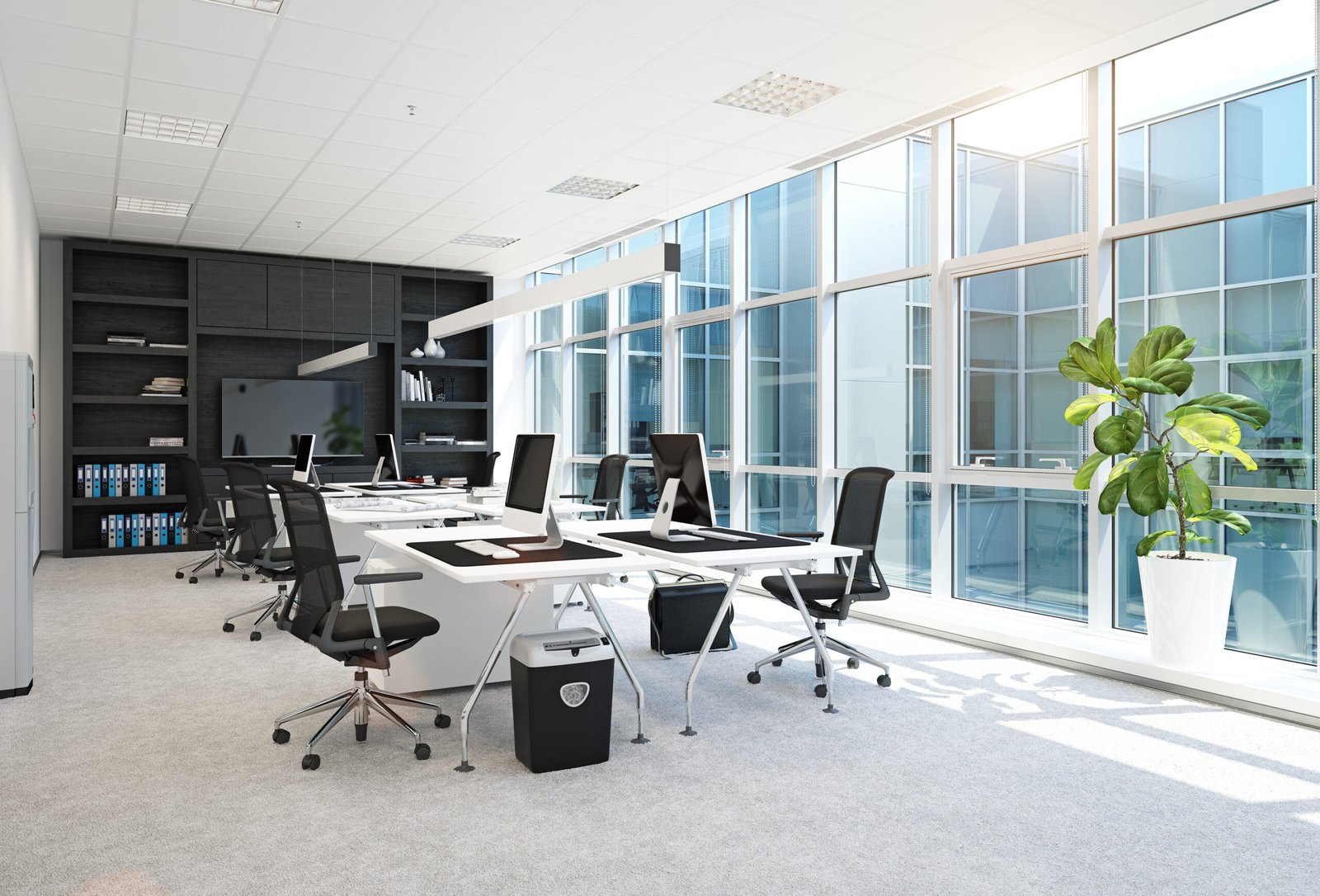 Un bureau moderne et spacieux, idéal pour les déménagements de bureaux, offre des postes de travail lumineux